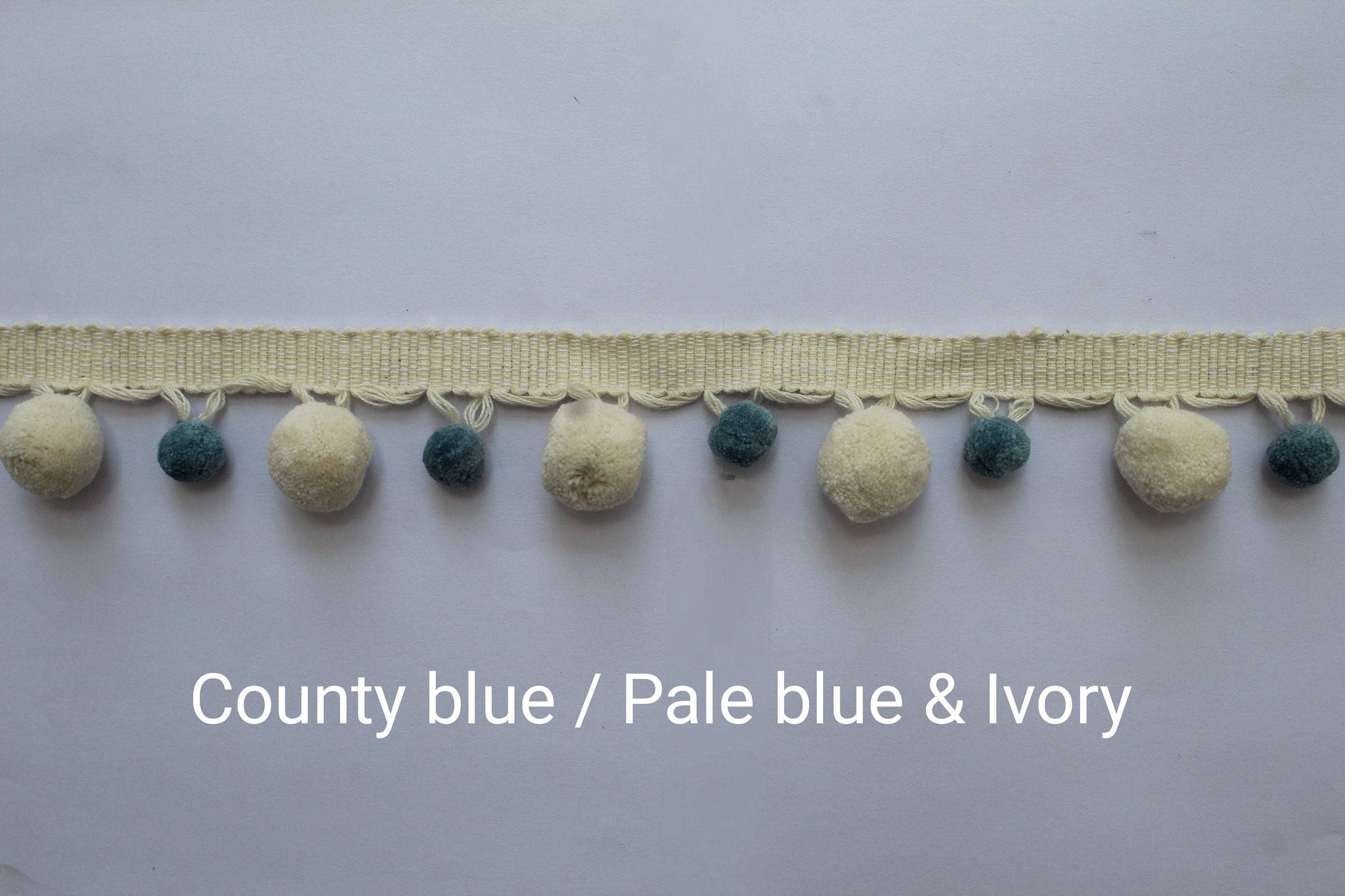 County blue / pale blue and ivory pom pom trim, faux fur pom poms, lace and trims, trim, bobble trim, pom pom garland, garland