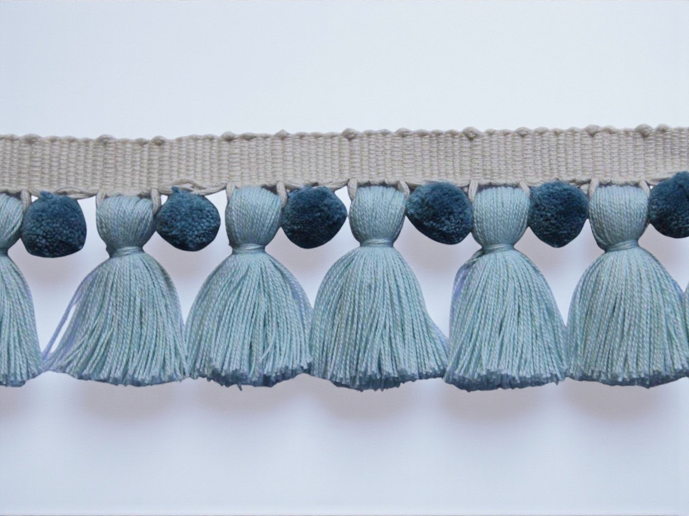 baby blue tassel, county blue pom pom, pale blue pom poms, pom pom tassel trim