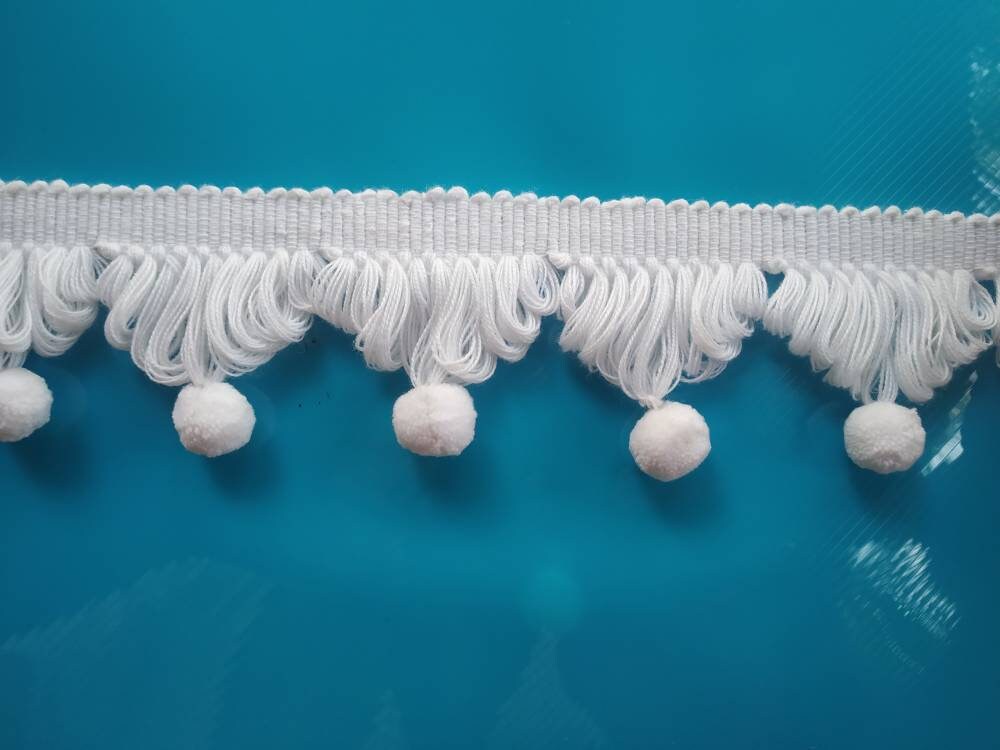 White pom poms, white fan edge trim, fan edge trim, fan trim, fringe trim, decorative trims, lace and trims