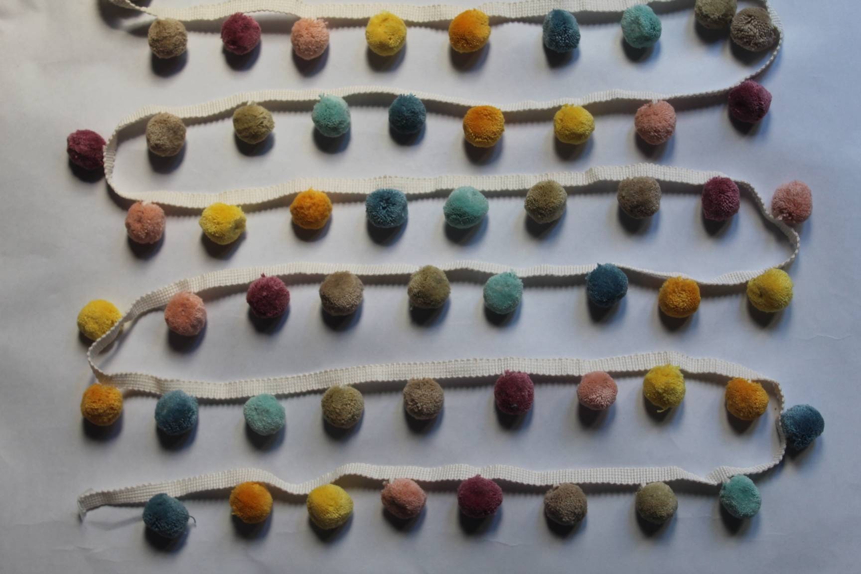 multi colored pom pom trim