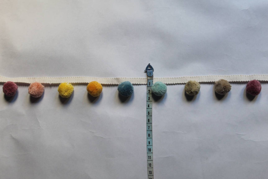 multi colored pom pom trim