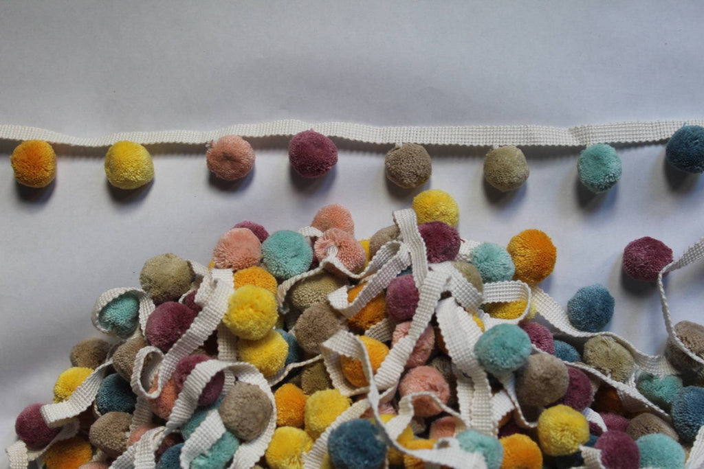 multi colored pom pom trim