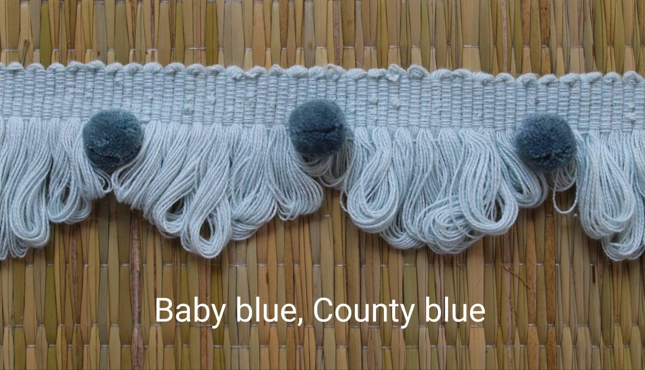 Fan edge trim with pom poms, baby blue and county blue fan edge trim with pom poms