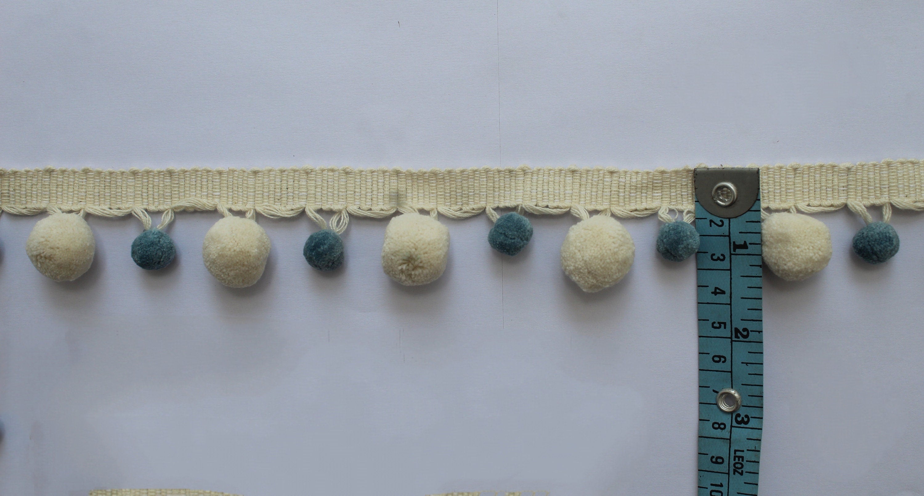 County blue / pale blue and ivory pom pom trim, faux fur pom poms, lace and trims, trim, bobble trim, pom pom garland, garland