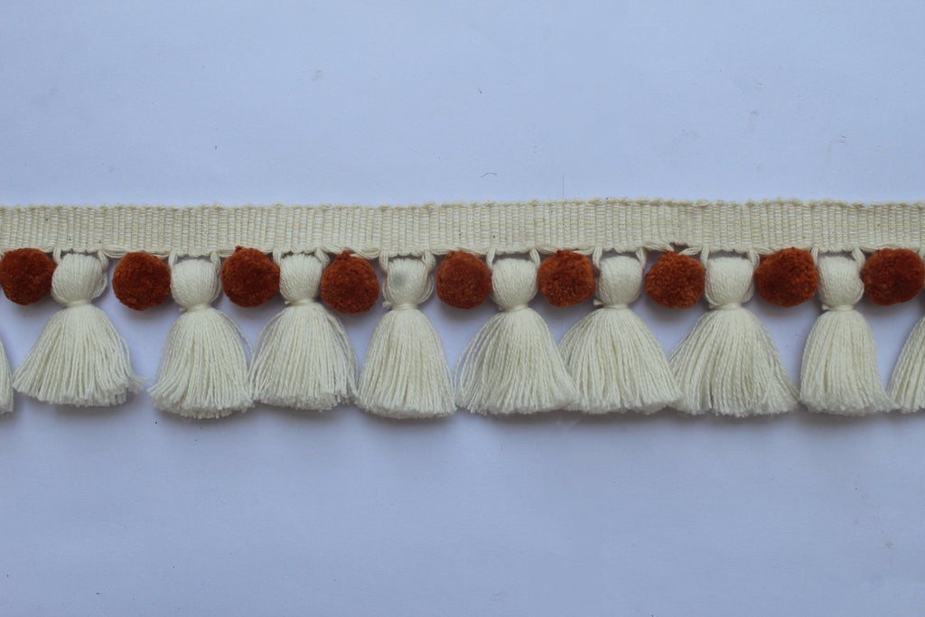 Saffron and ivory pom poms tassel trim