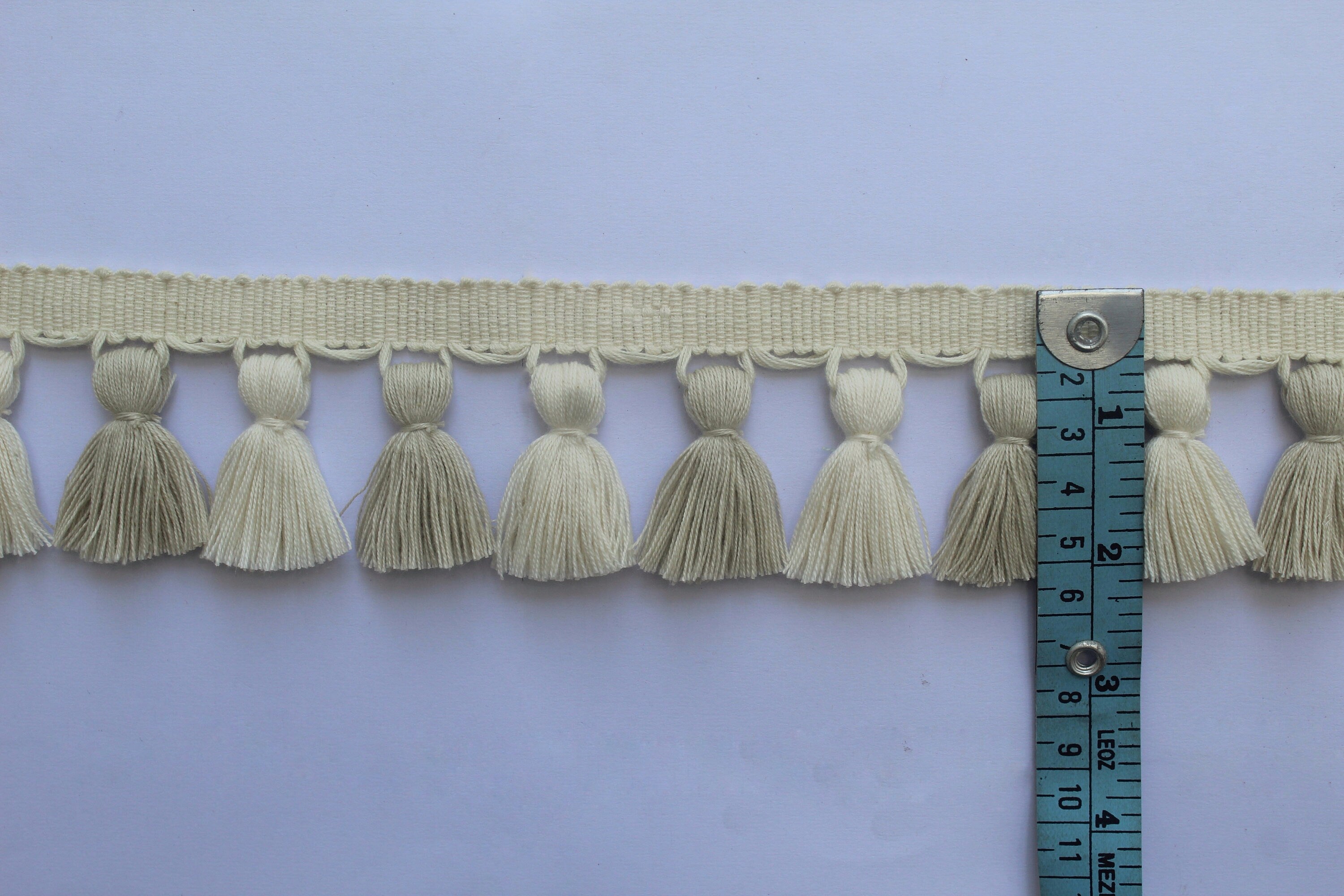 Light stone and ivory tassel trim, tasssl fringe, tassel fringe trim, fringe trim, fringe tassel, trim, home decor, tasssl and trims