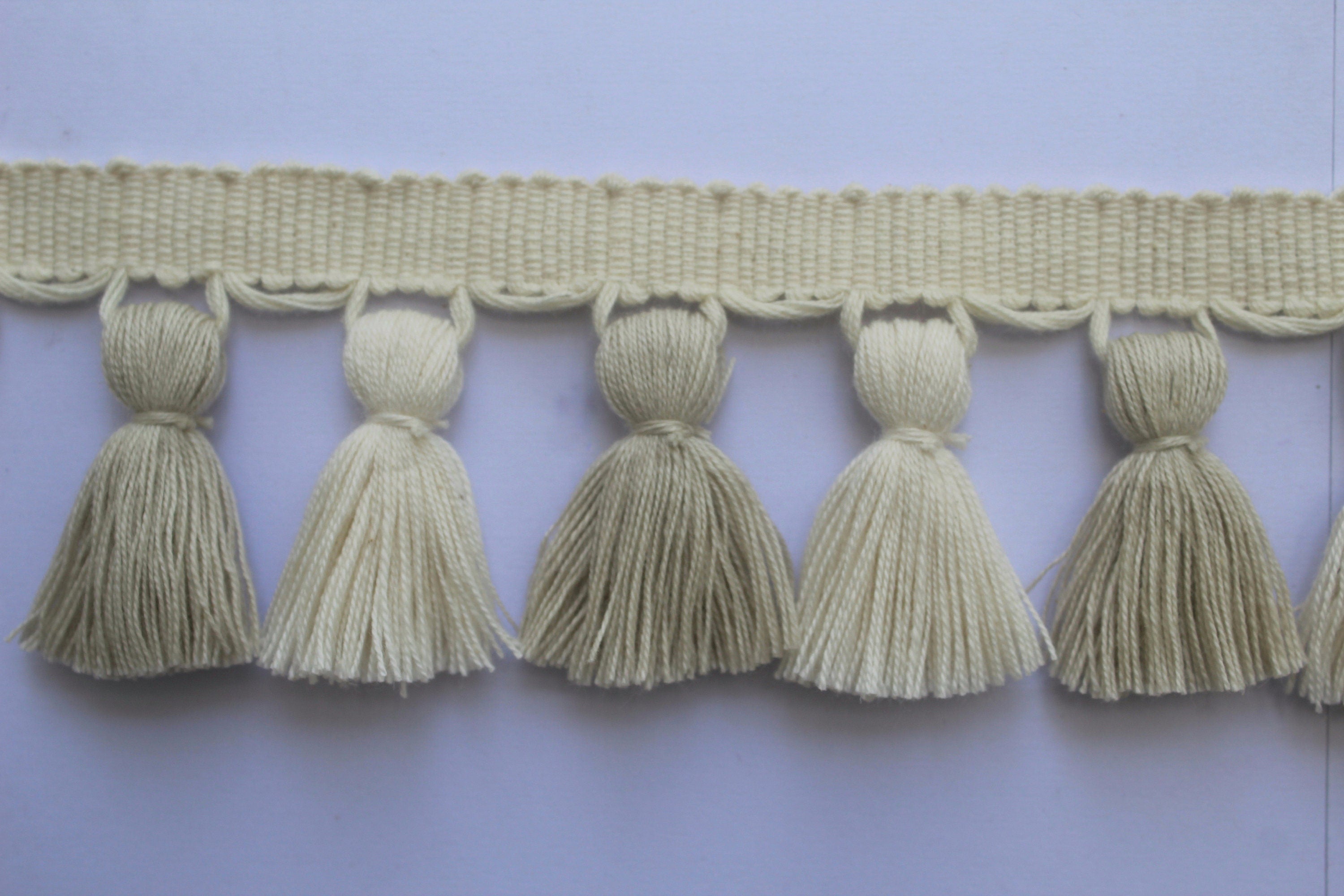 Light stone and ivory tassel trim, tasssl fringe, tassel fringe trim, fringe trim, fringe tassel, trim, home decor, tasssl and trims