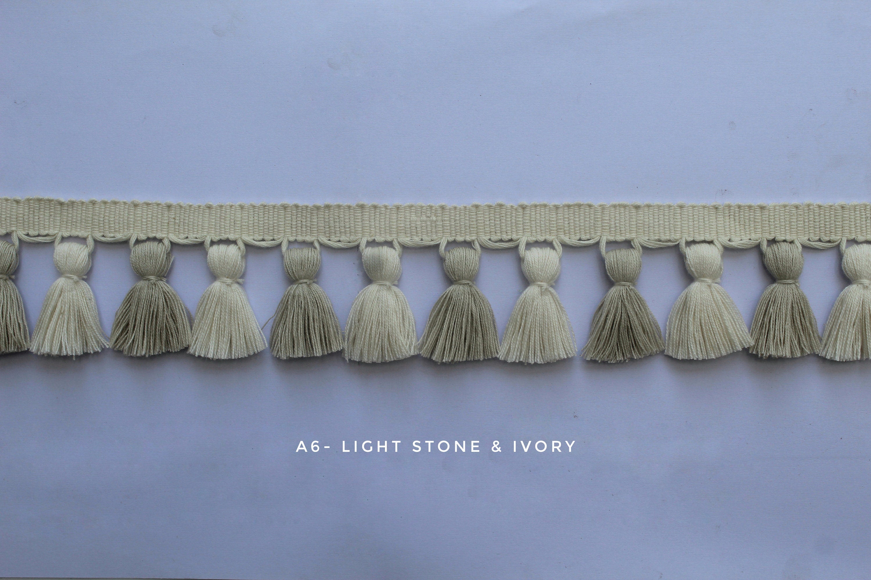 Light stone and ivory tassel trim, tasssl fringe, tassel fringe trim, fringe trim, fringe tassel, trim, home decor, tasssl and trims